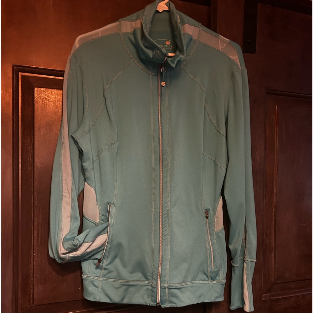 Track Jacket poly/spandex blend. Zipper closure with zipper pockets